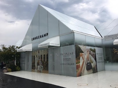 Longchamp Outlet Villefontaine, Magasin de Vêtements à Villefontaine