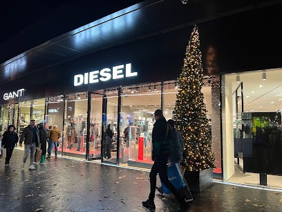 DIESEL OUTLET LYON, Magasin de Vêtements à Villefontaine
