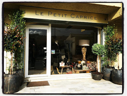 Le Petit Caprice Magasin De Vêtements à Propriano