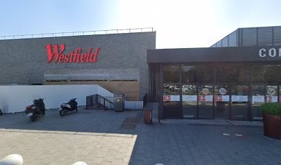 Renato Belli, Magasin de Vêtements au Chesnay